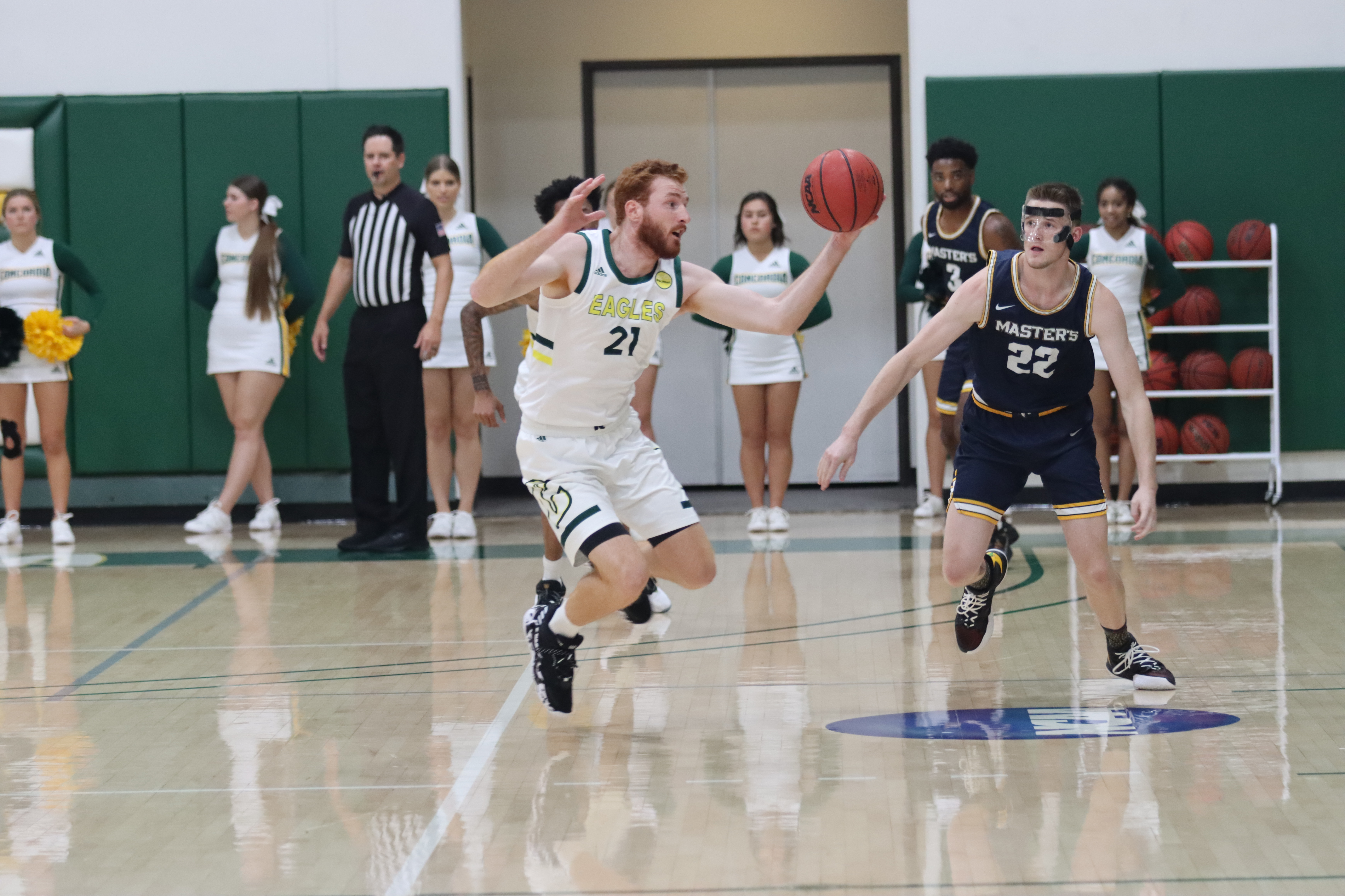 Matt Weyand steals the ball from Masters player